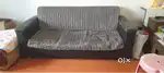 A three-seater striped sofa