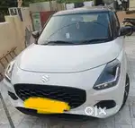 Maruti Suzuki Swift LXI Base. model March 2025 Petrol 1800 Km Driven