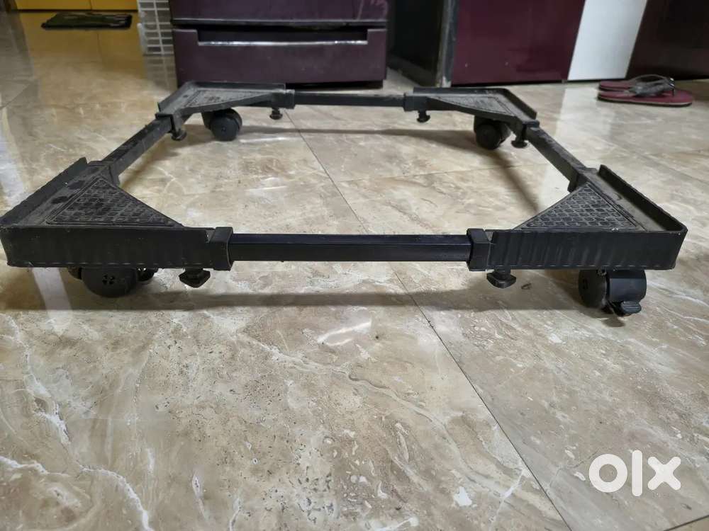 Washing machine stand with wheels