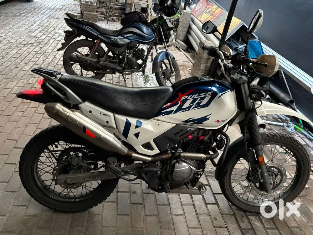 Xpulse2004v with original MWexaust and rally seat and handlebar raiser