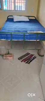 Iron cot with bed