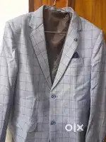 A Formal Blue Coat with Black-Grey touched basket.