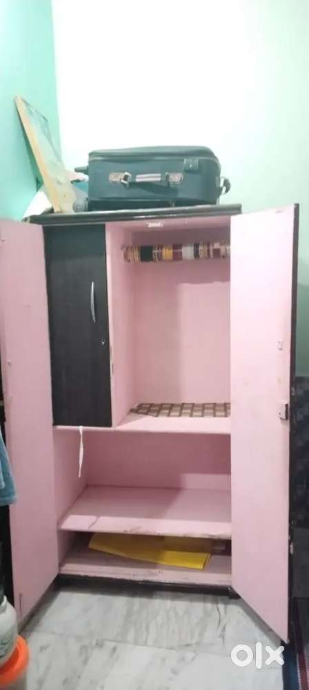 Well maintained brown wooden almirah