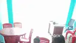 Round dining table and chairs and cash counter