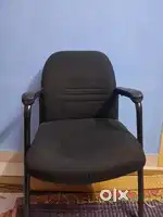 Red swivel Wheel chair & Black conference Chair