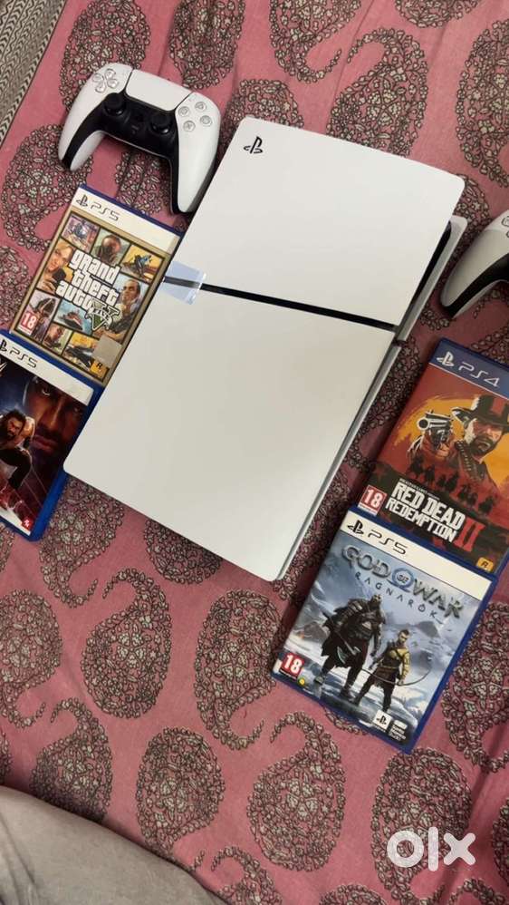 Playstation 5 with 9month warranty 4 games and 2 controler and charger