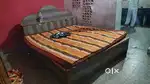 Big double wooden bed