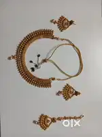Want to sell my artificial gold plated necklace with matching earing