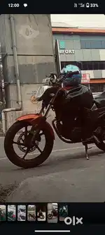 Elactra front shock added , pulser 220 carbrator added