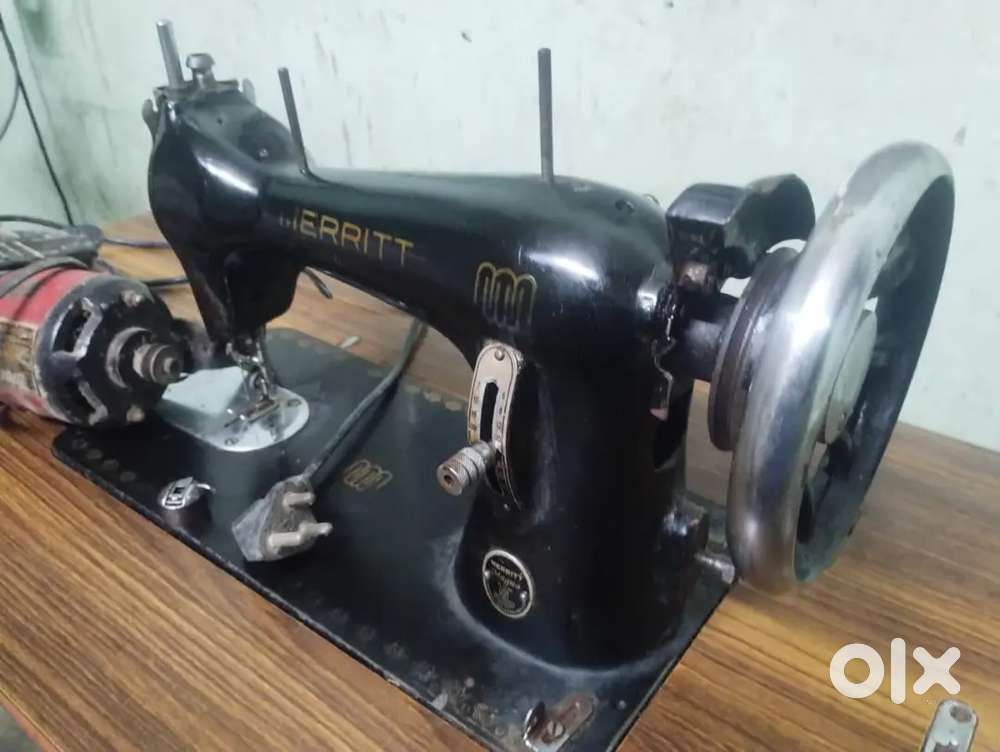Merritt tailor machine with table also with moter