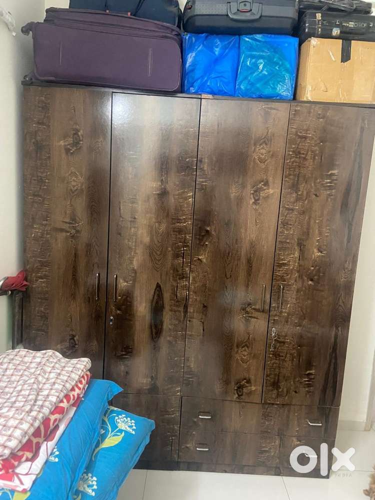 A four door wooden wardrobe