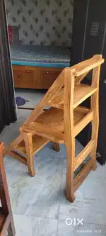 Kitchen cabinet and chair cum ladder are for sale.