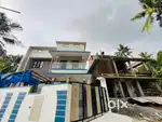 House near green field stadium