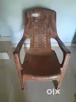 One plastic relaxing Chair.
