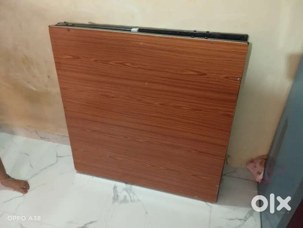 Wood n iron bed & working projector