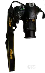 NIKON D3400 with 55mm lens & 128 GB SD Card in fine condition.