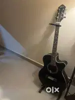 Guitar in excellent condition with stand