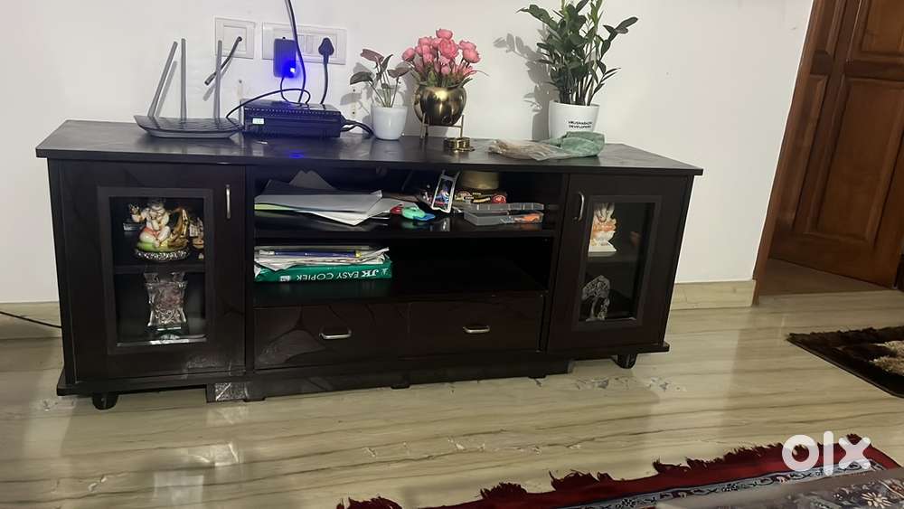 New TV units n Dinning table with 6 chairs only 6 months old