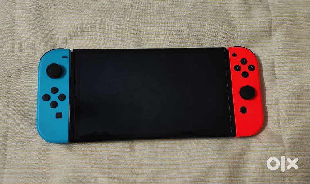 Nintendo Switch OLED with box 256GB + 23 Games for 29500