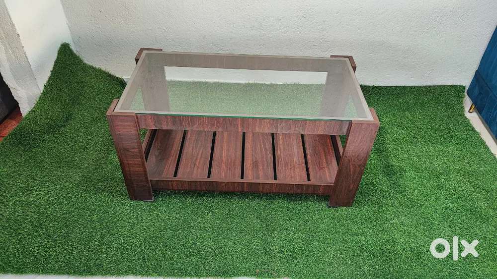 Brand new glass top center table at very low price