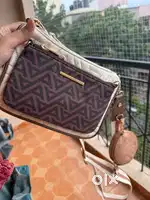 ALDO Geometric PU swagger sling bag