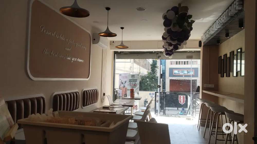 Team mumber in icecream parlour