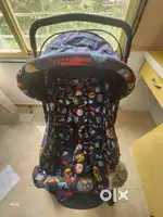 y
Babyhug Cosy Cosmo Stroller With Reversible Handle & Back Pocket