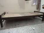 Two antique wood single cots