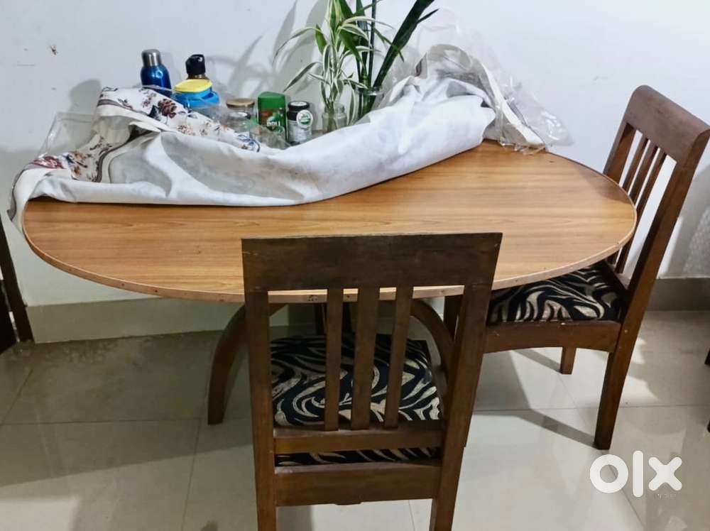 One Dining Table and three chairs