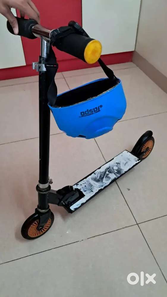 Skate scooter 2 wheels for kids sparingly used good condition & helmet