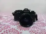 Antique Yashica FX-3 camera with lens