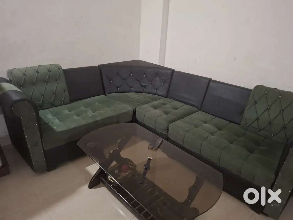 Sofa with table like brand New..only 1 year old