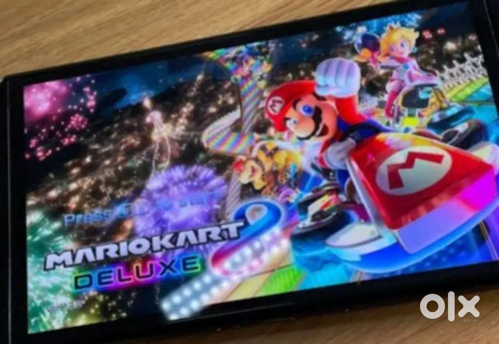 Nintendo Switch OLED with box 256GB + 23 Games for 29500