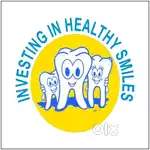 Dentist dental surgeon and dental assistant or receptionist