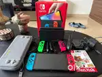 Nintendo Switch OLED with Extra Joy Cons, 512GB Micro Sd, tomtoc case