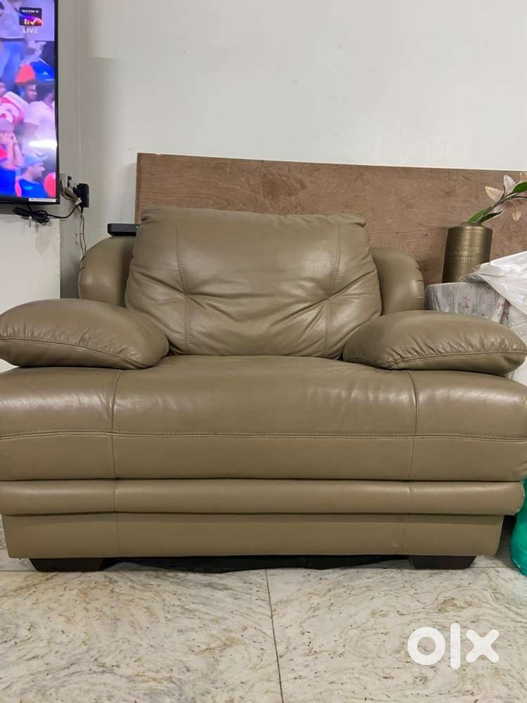 One seater leather sofa in beige colour