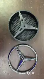 Mercedes Benz logo with stand