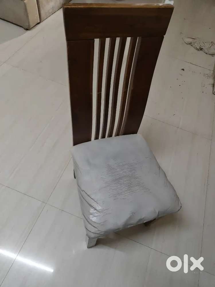 Dining table with 4 chair and one big chair