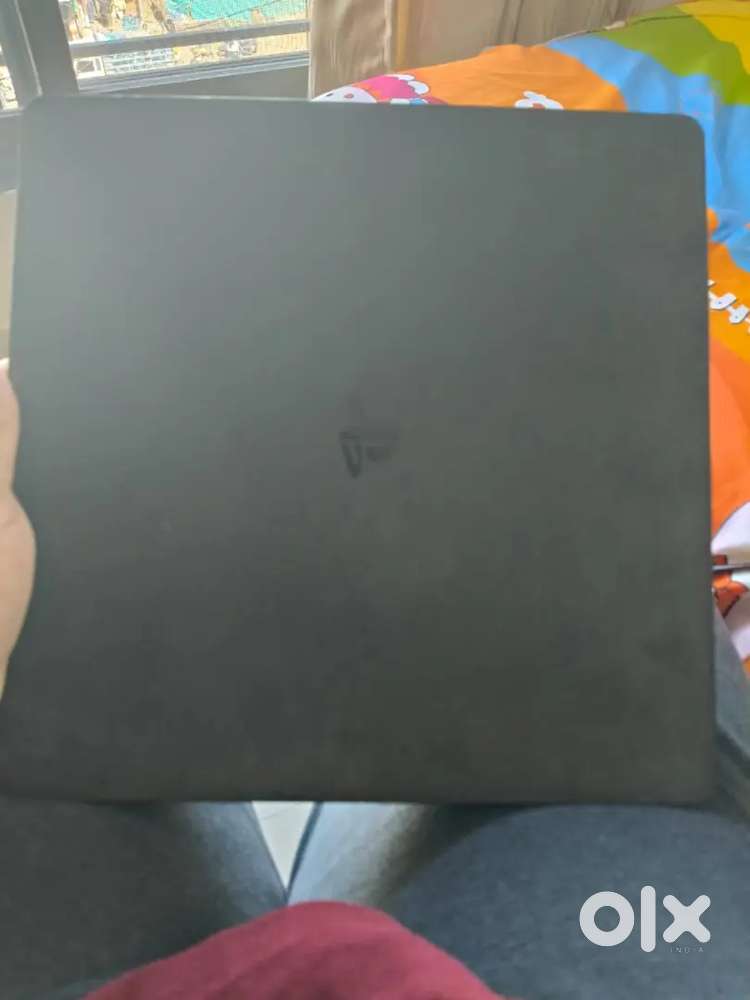 PS4 slim 825 GB storage just two yrs good condition