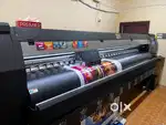 Graphic designer and flex printer operator
