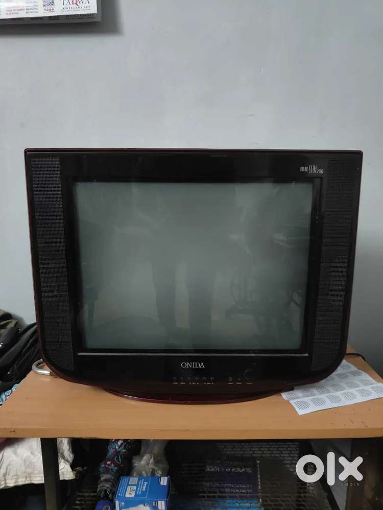 TV with Dish And Set-up Box And Table