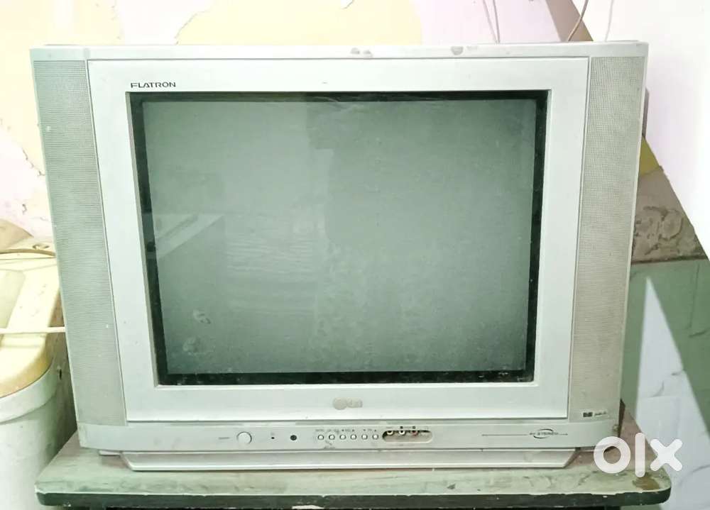 LG FLATRON Tv in light grey colour .