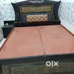 Dark brown double bed with inner storage and with 2 side tables