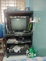 Samsung TV, Epson TV stand, Airtel TV dish with setup box, Samsung DVD