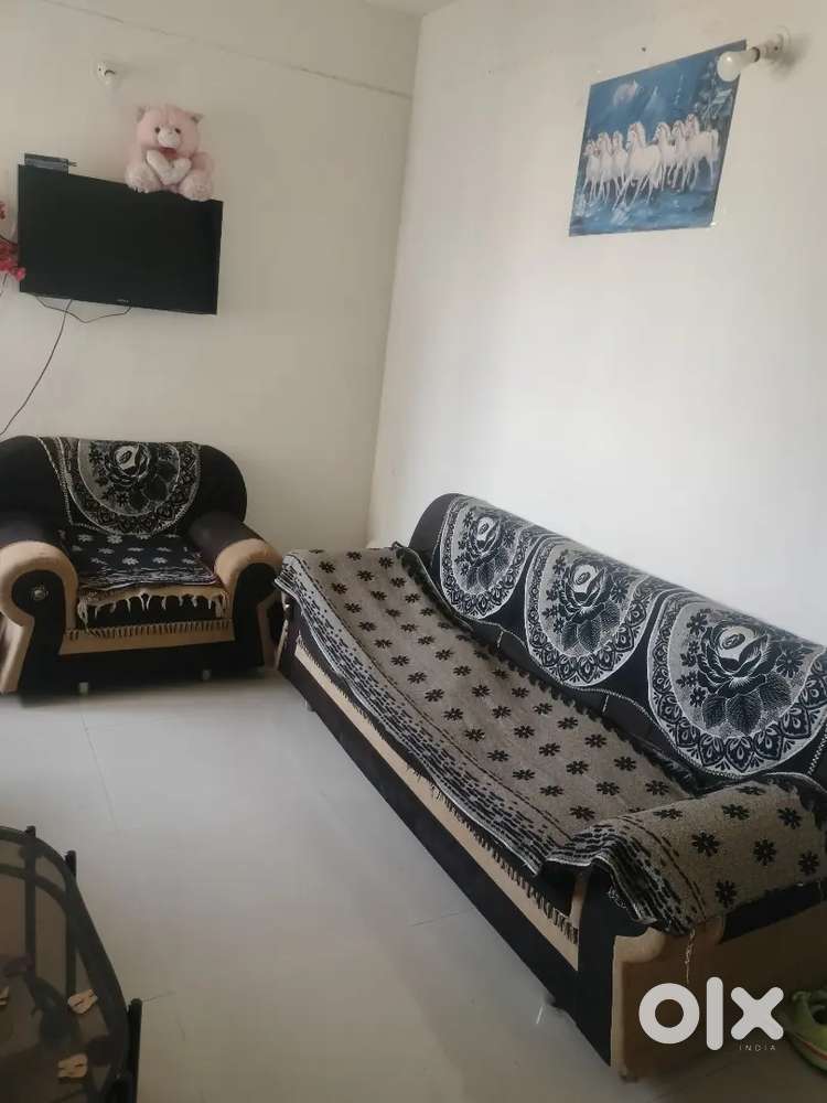 Four sitter sofa with cover