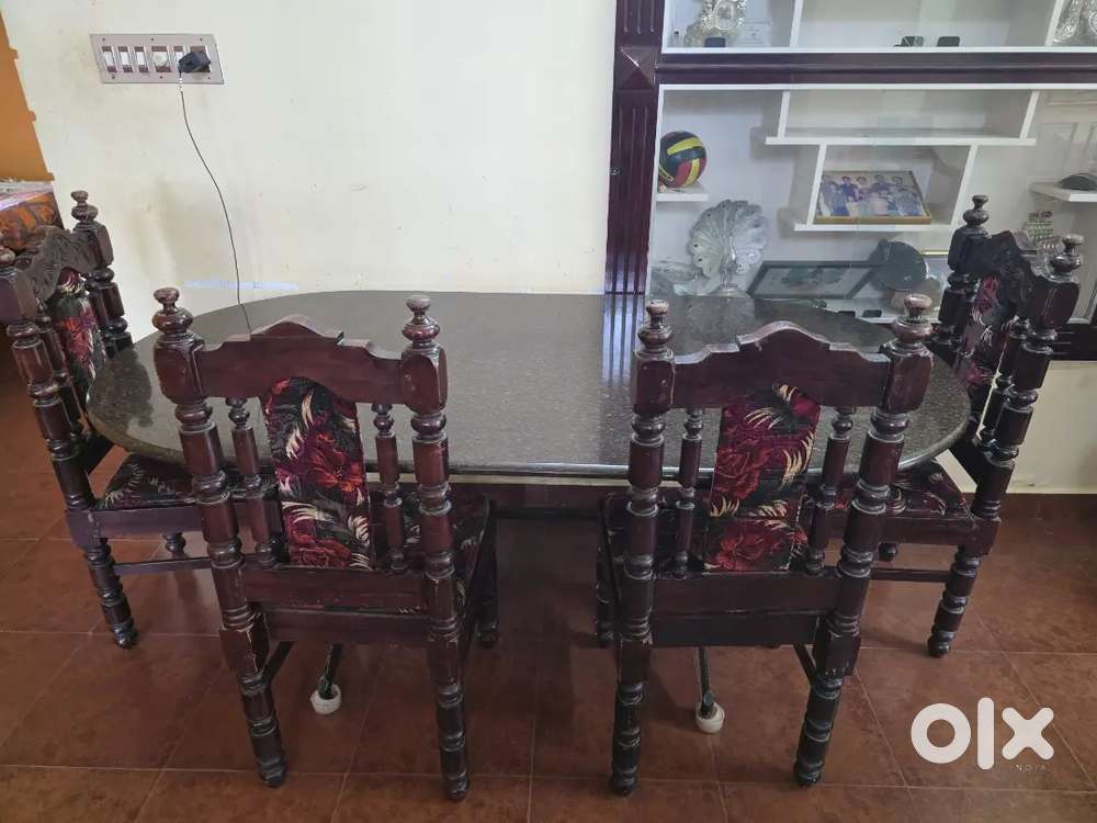 6-Seater Dining table with granite top and 6 chairs for sale