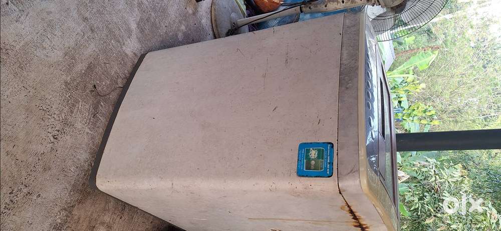 An Lg top load 6Kg fully automatic washing machine