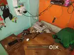 Wooden corner table with storage drawers