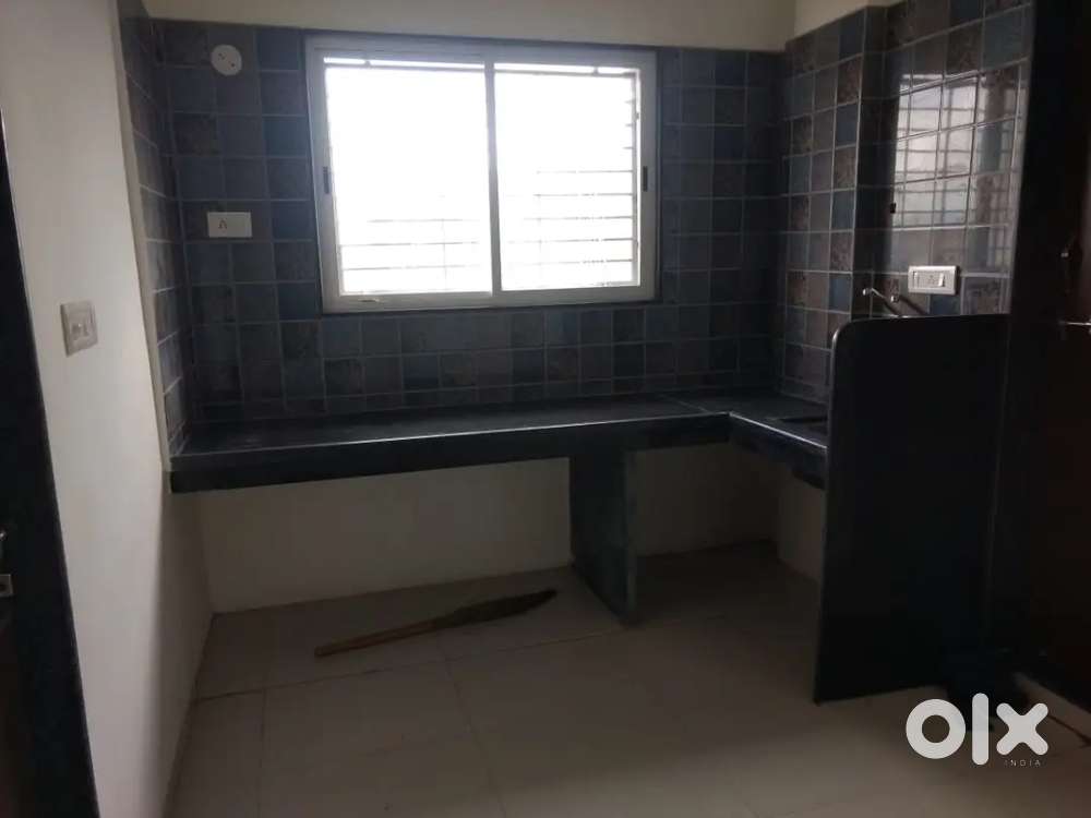 .2bhk flat located in shivaji nagar, infront of Nehru College.