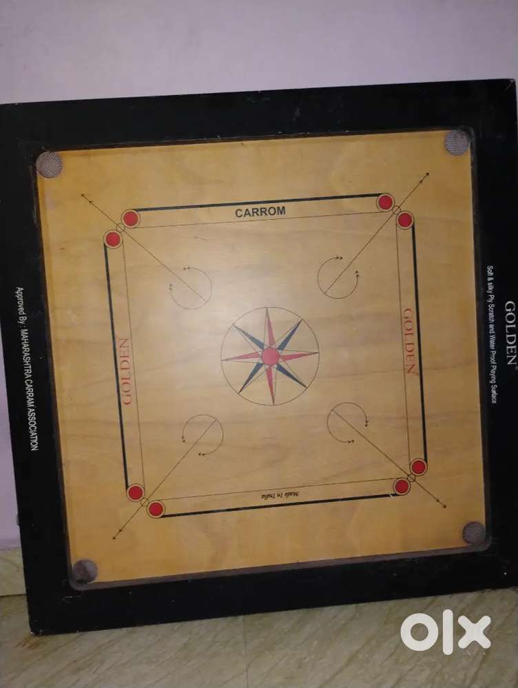 Golden carrom board